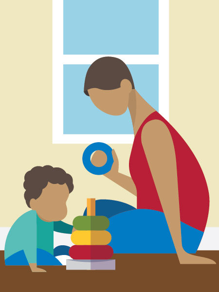 parent playing with young child
